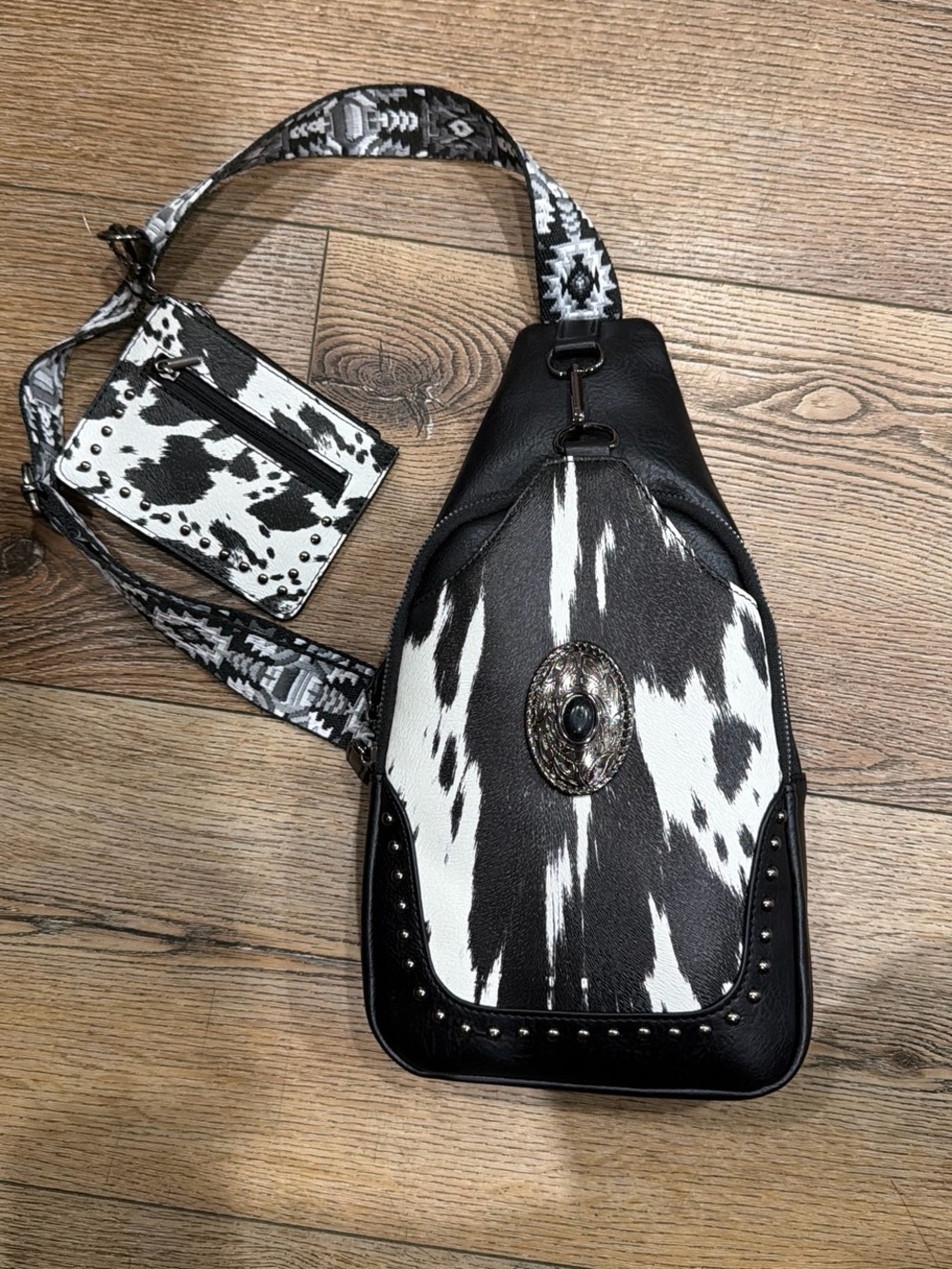 Black & White Cowhide Crossbody Sling Bag with Concho Accent